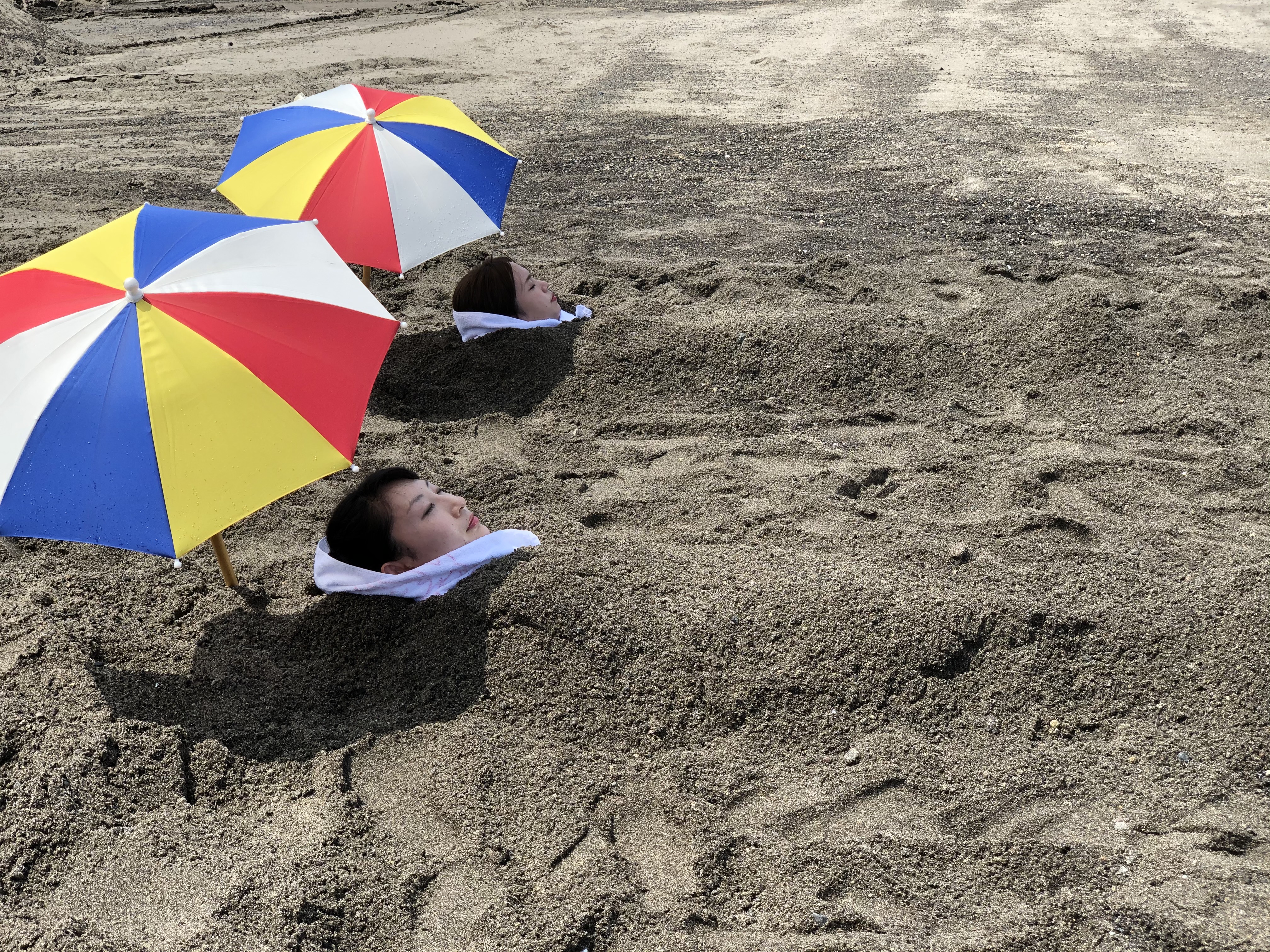 Tourists enjoying a sand bath in Ibusuki